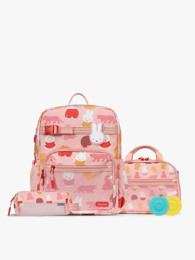 Colorful CALPAK + Miffy Kids Essentials Set with children's Large backpack, lunch bag , pencil case set on a white background with pink accents and Miffy with other animals; BCKL5000-MIFFY-PINK-ZOO-TRIP view 1