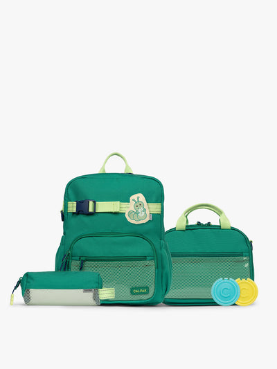 Green CALPAK Kids Small Essentials Bundle that includes backpack and lunch bag, and pencil case light gray background; BCKS5000-GREEN view 1