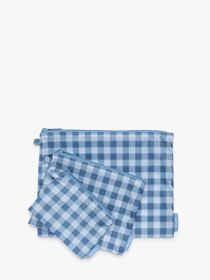 CALPAK Compakt Zip Pouch Set in white and blue gingham print French Blue Gingham