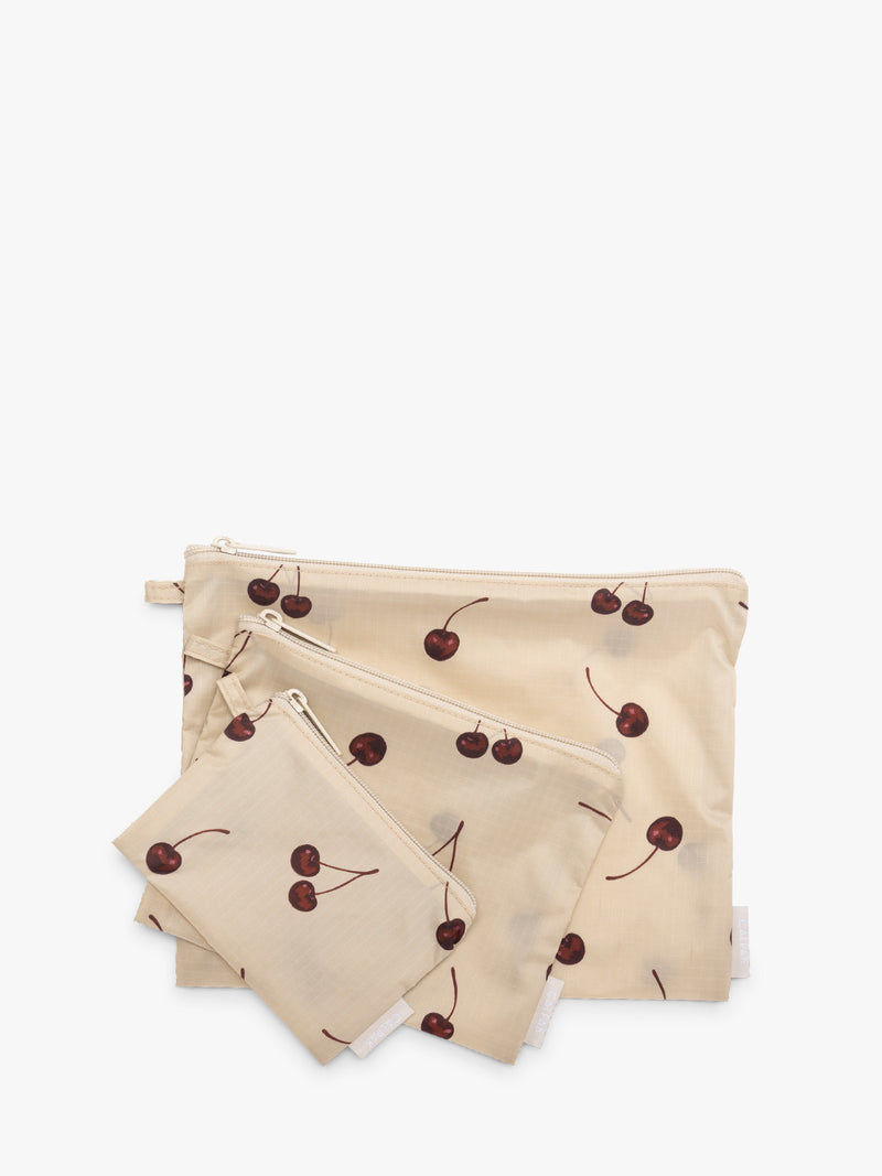 CALPAK  Compakt Zippered Pouch in beige with cherry pattern
