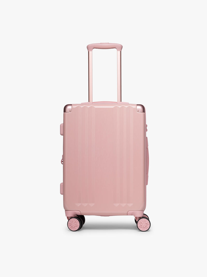 CALPAK pc Ambeur Luggage Set featuring the Ambeur Carry-On  in metallic pink Blossom with pink wheels