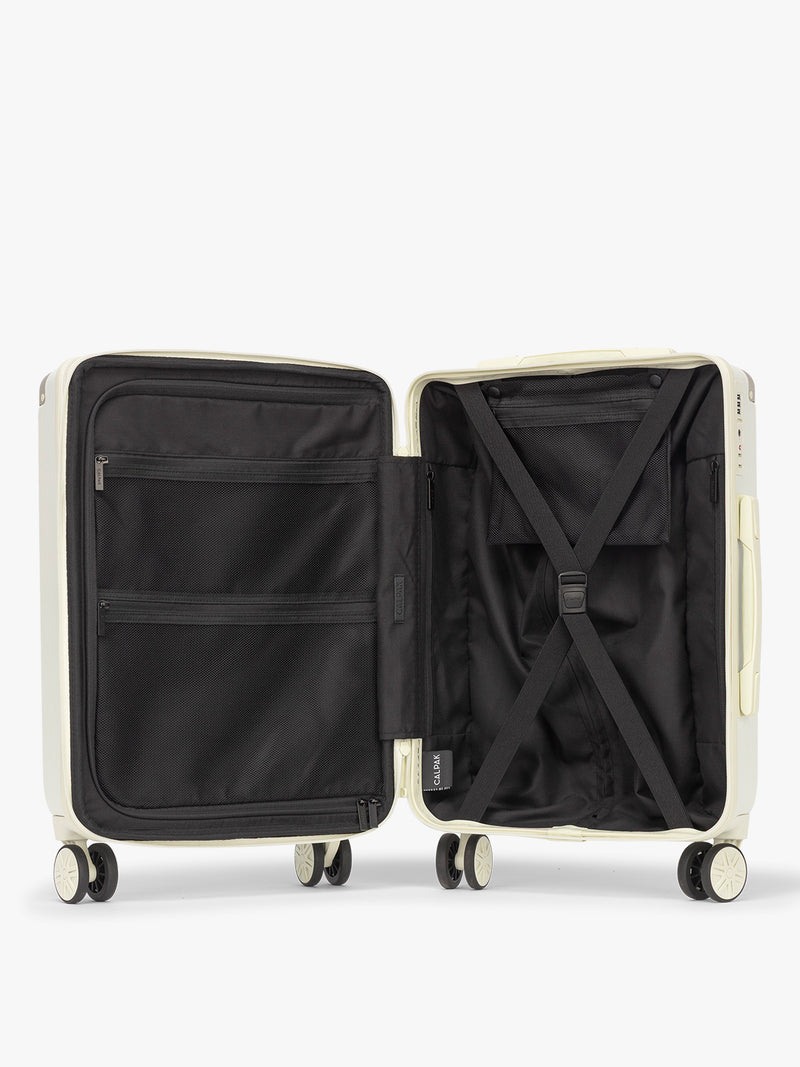 Opened CALPAK Ambeur Carry on Luggage in light green Celadon