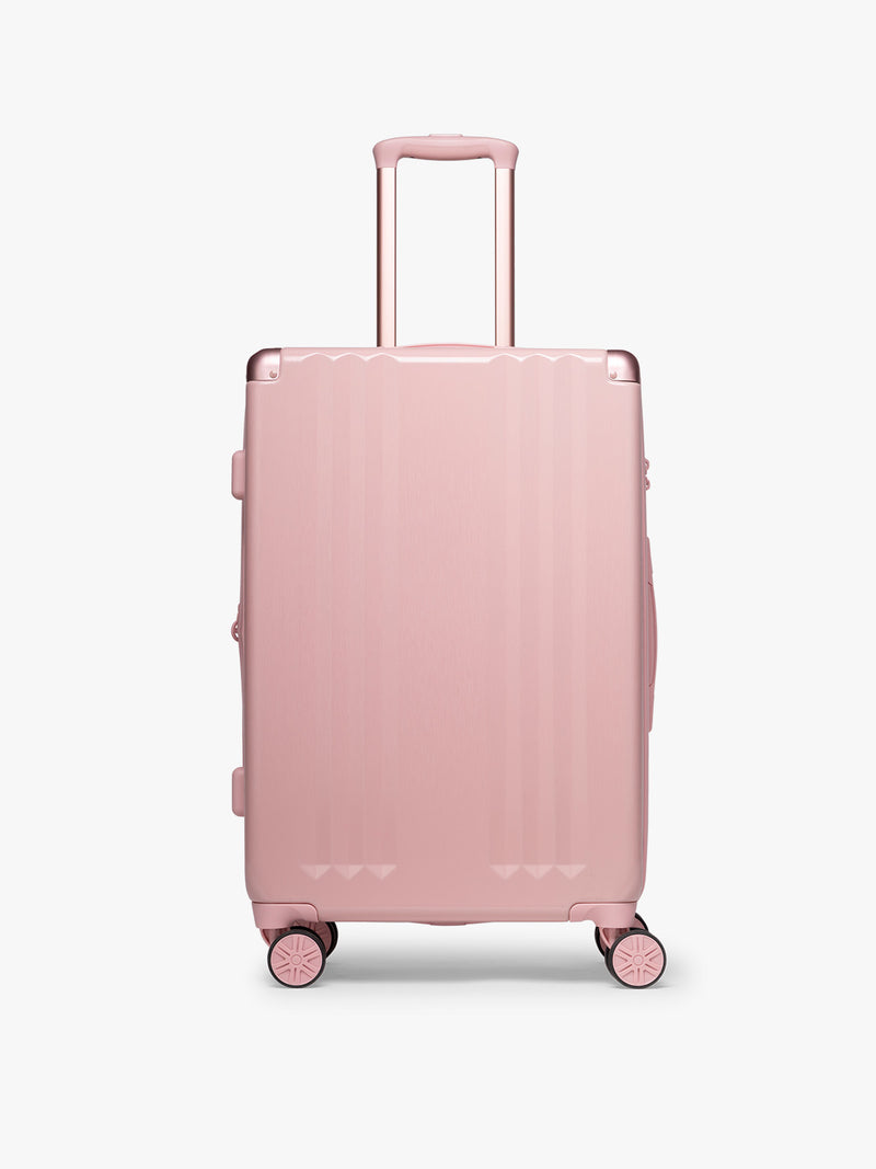 CALPAK pc Ambeur Luggage Set featuring the  Ambeur Medium Luggage in metallic pink Blossom with pink wheels