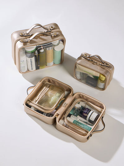 CALPAK Large clear makeup bag with zippered compartments in metallic gold; CCC2001-GOLD view 2