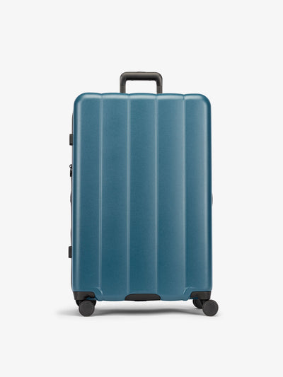 CALPAK Pacific blue large luggage made from an ultra-durable polycarbonate shell and expandable by up to 2; LCO1028-PACIFIC view 1