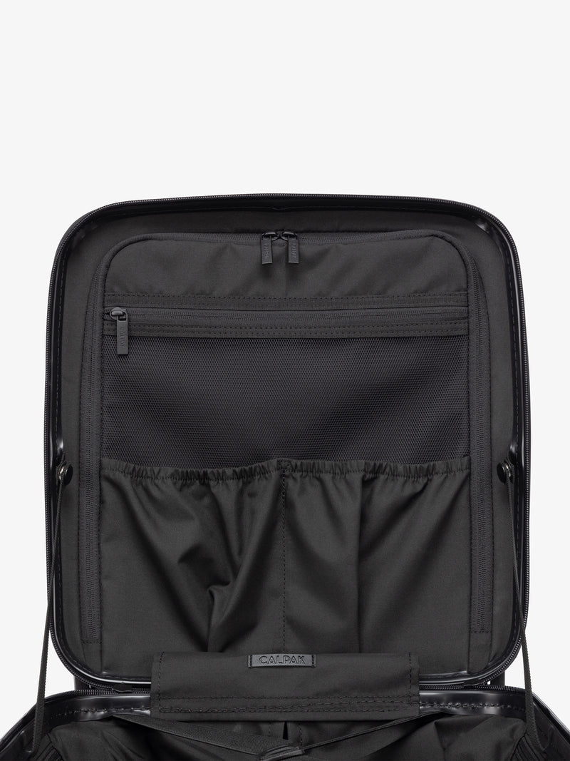 CALPAK Hue Mini Carry-On Luggage in blue Bluebell interior with zipper and mesh