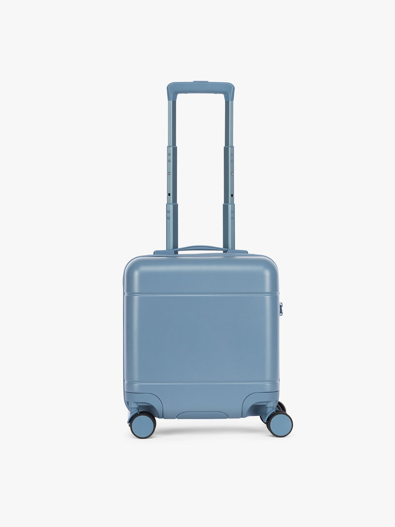 CALPAK Hue Mini Carry On in light blue French Blue with Gingham interior