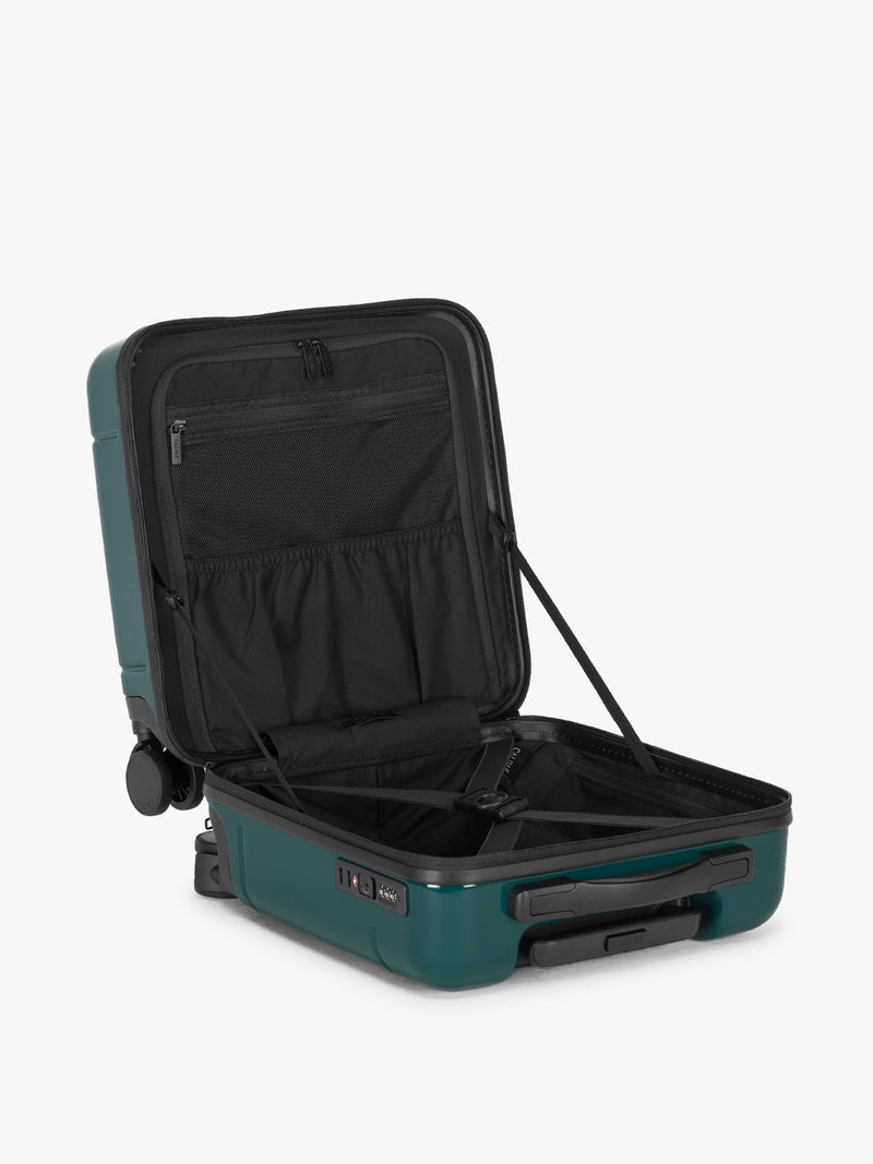 Opened CALPAK Hue Mini Carry-On Luggage in dark green Kale