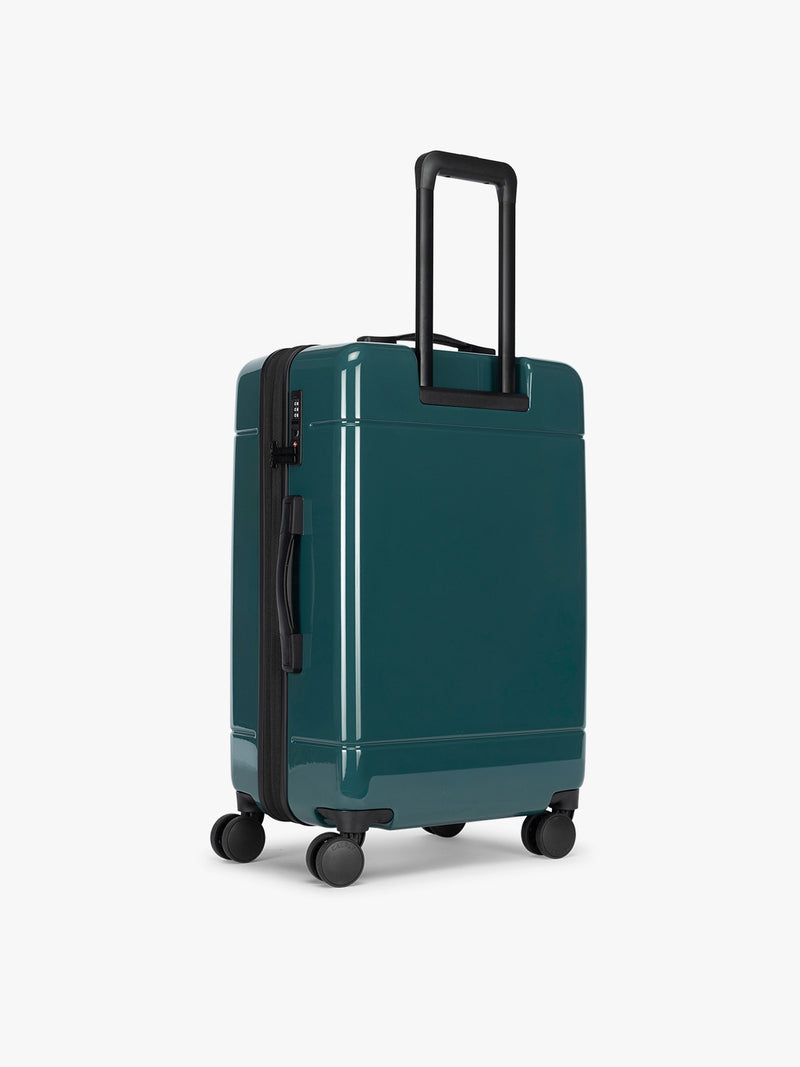 Backside of CALPAK Hue Medium Luggage in dark green Kale