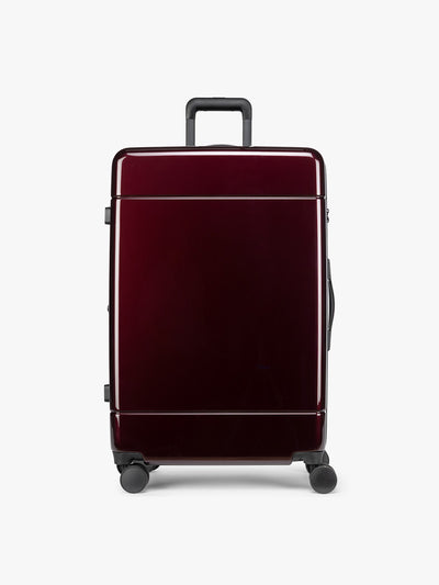 CALPAK maroon Hue Large Luggage in Glazed Dark Cherry; LHU1028-GLAZED-DARK-CHERRY view 1