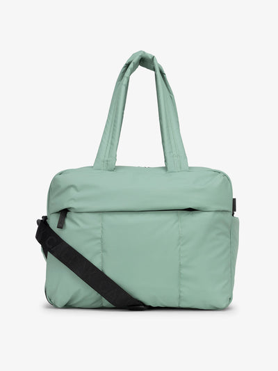 CALPAK Luka Duffel puffy Bag with detachable strap and zippered front pocket in sage green; DSM1901-SAGE view 1