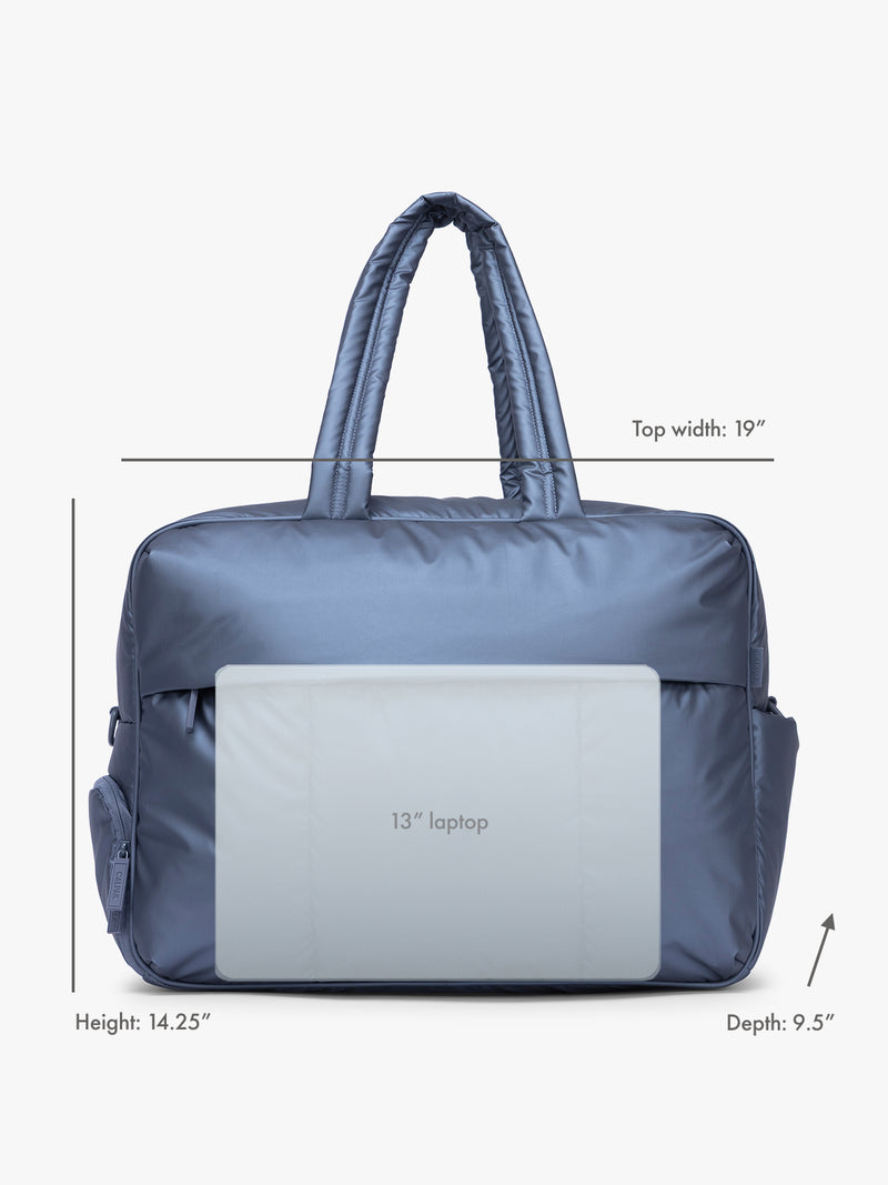 13" laptop overlay for size reference on CALPAK Luka Large Duffel in metallic indigo