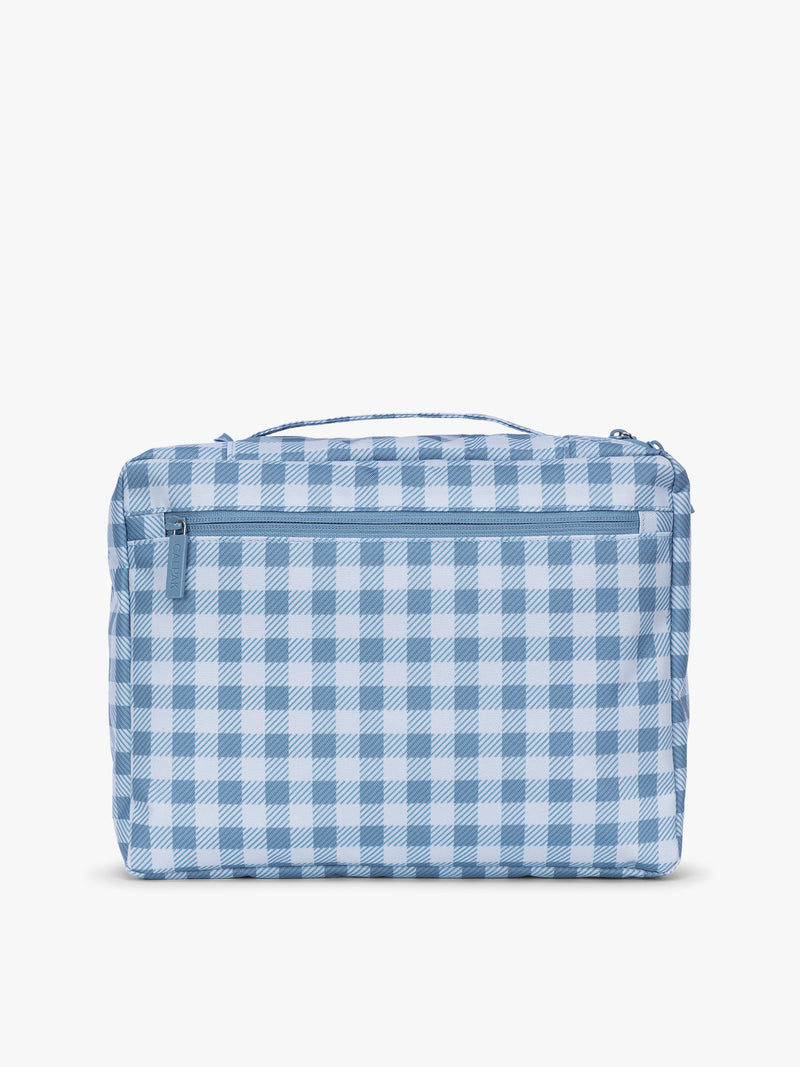 Backside of a packing cube that is part of CALPAK Packing Cubes 5-piece Set in white and blue gingham print in French Blue Gingham