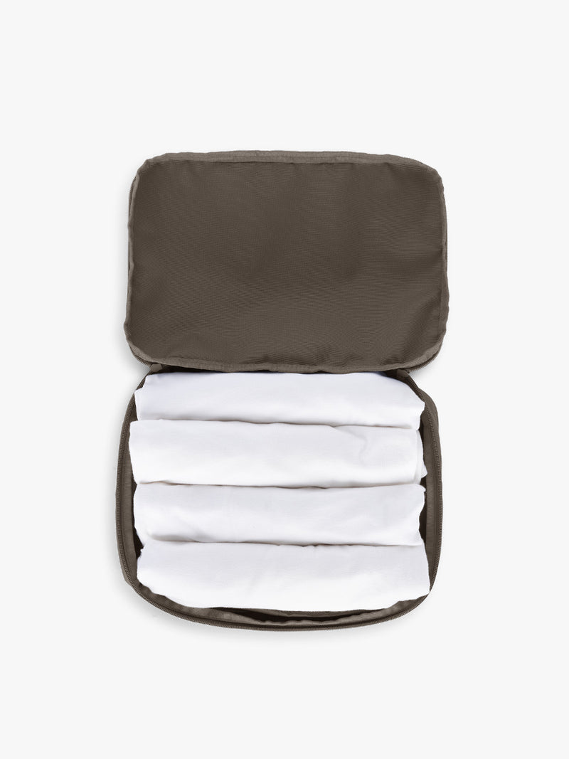 Opened CALPAK Medium Compression Packing Cubes in brown Mushroom