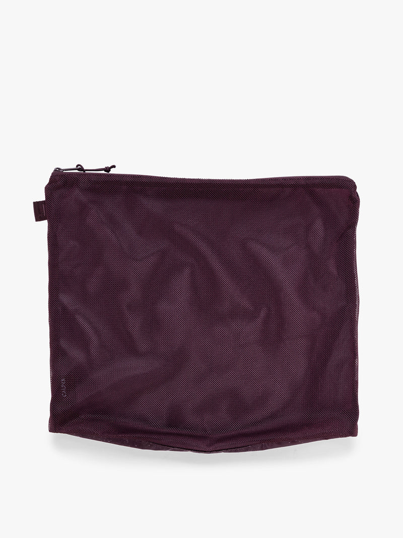 Zippered pouch of the CALPAK Terra 5pc Packing Cube Set in dark red Dark Cherry on a white background