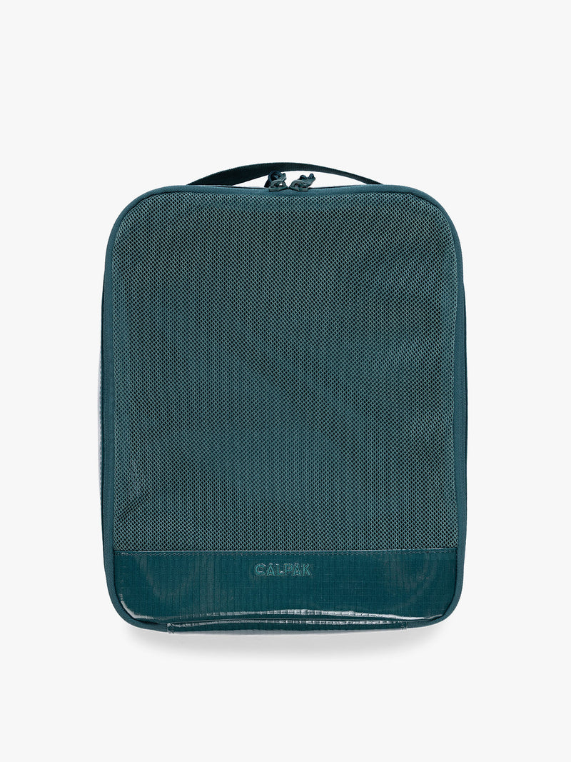 Large size packing cube of the CALPAK Terra 5pc Packing Cube Set in blue green Kale on a white background