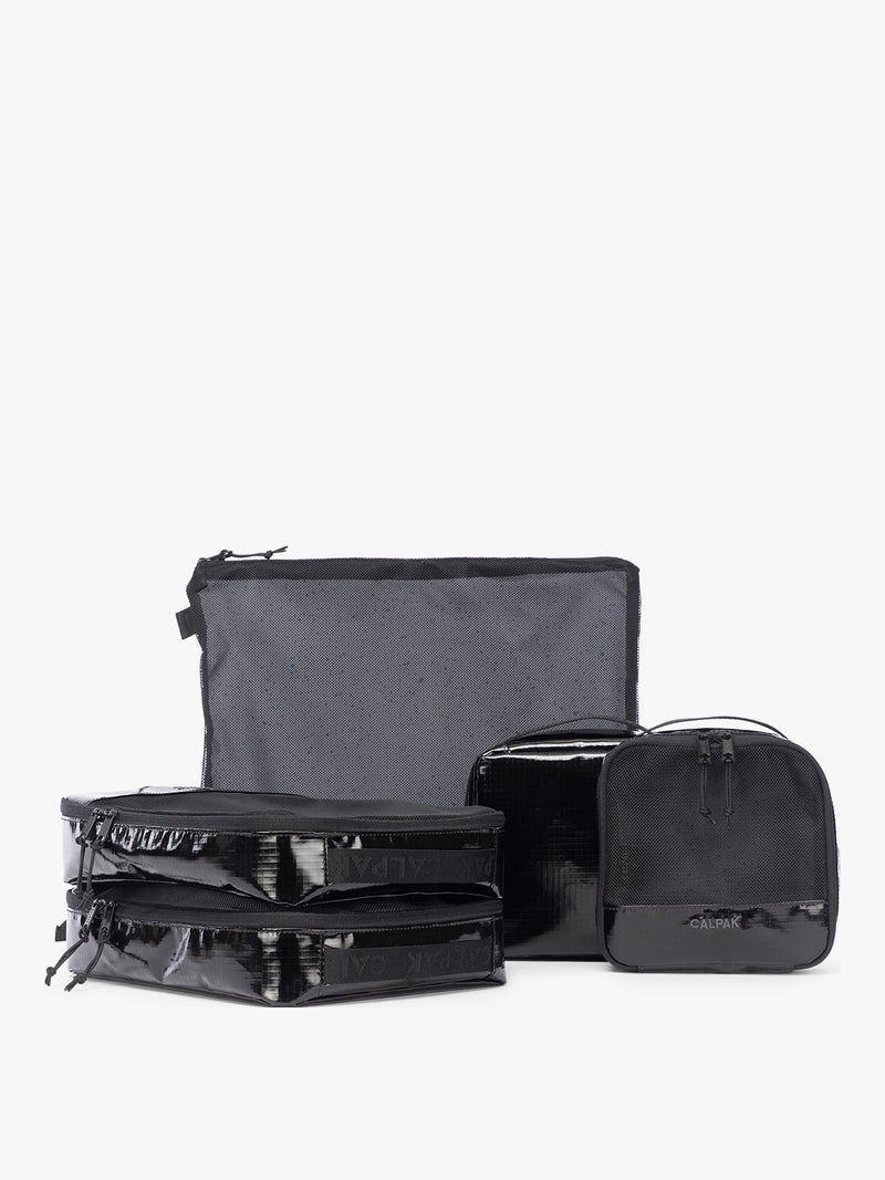 CALPAK Terra 5-Piece Packing Cube Set in black Obsidian with two small cubes, two medium cubes, and one large mesh cube with zippers and mesh