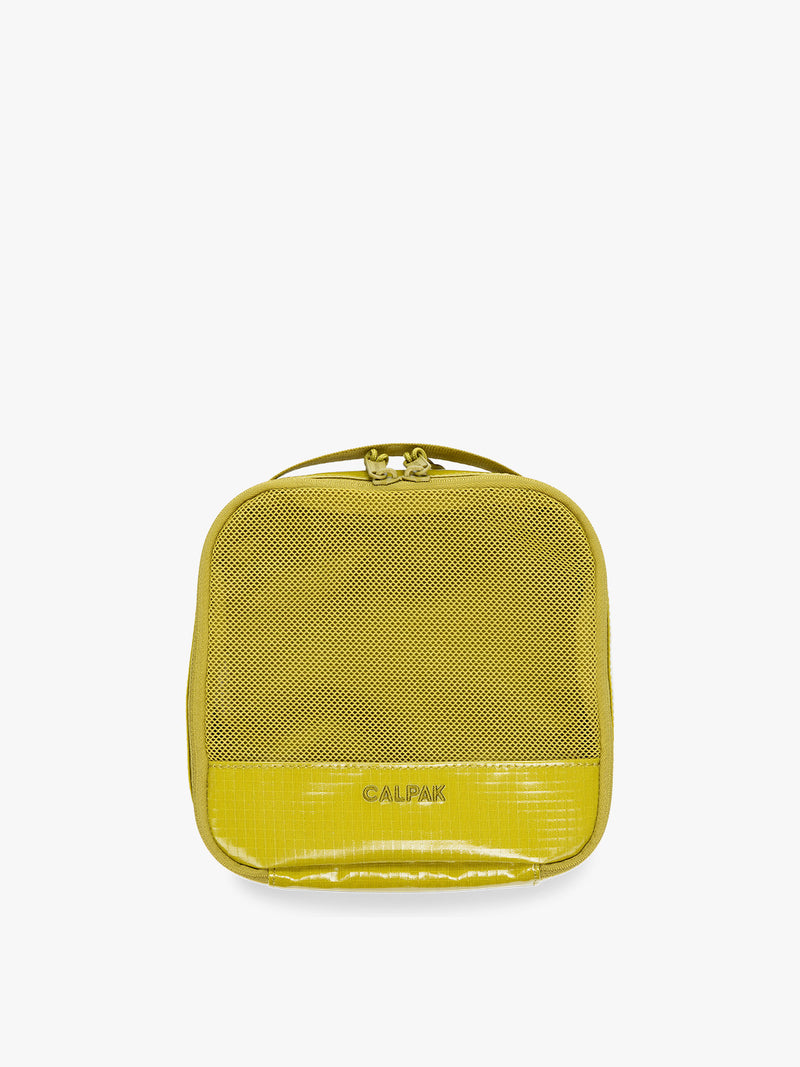 Small size packing cube of the CALPAK Terra 5pc Packing Cube Set in yellow green Wasabi on a white background