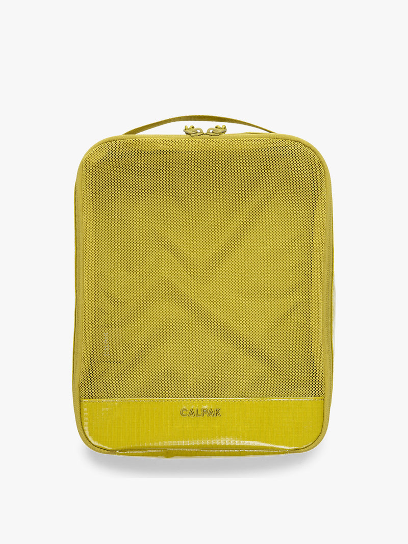 Large size packing cube of the CALPAK Terra 5pc Packing Cube Set in yellow green Wasabi on a white background