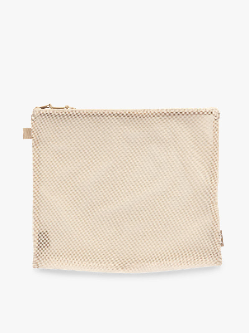 Large size packing cube of the CALPAK Terra 5-Piece Packing Cube Set in off-white beige White Sands with two small cubes, two medium cubes, and one large mesh cube with zippers and mesh
