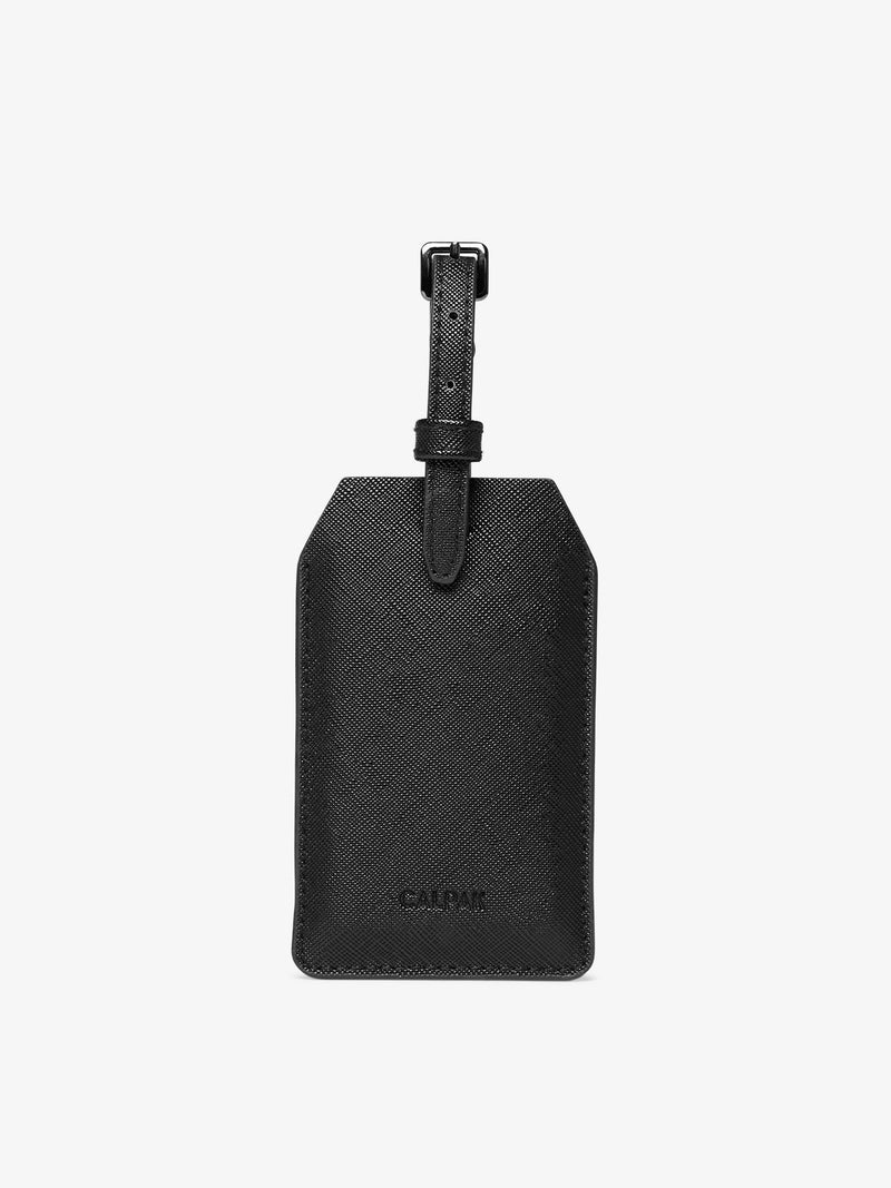 CALPAK Portable Luggage Tag + Charger with faux leather exterior in black