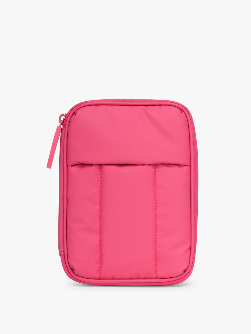 CALPAK Luka Zip Passport Wallet in bright pink Dragonfruit on a white background