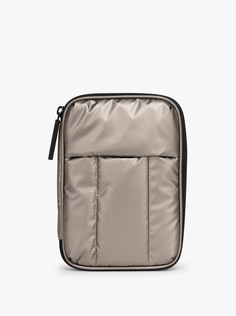 CALPAK Luka Zip Passport Wallet in metallic grey on a white background