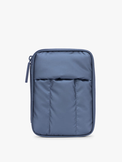 CALPAK Luka Zippered Passport Wallet in dark blue metallic material in Metallic Indigo; PZW2301-METALLIC-INDIGO view 1