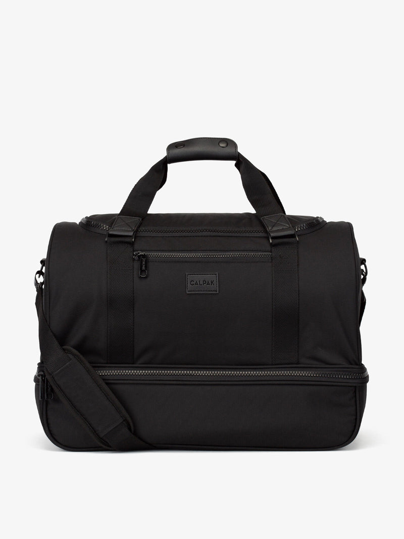 The Stevyn Duffel Bag in black, with top handle, detachable shoulder strap, and bottom zipeered shoe compartment