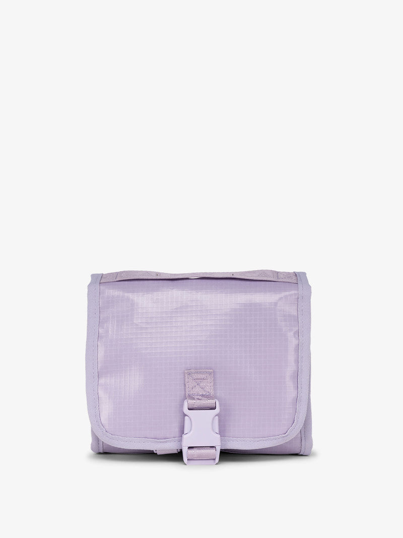 The Terra Hanging Toiletry Bag in amethyst, featuring a rectangular design with a front zipper and top handle. The bag is designed to hang for easy access to toiletries
