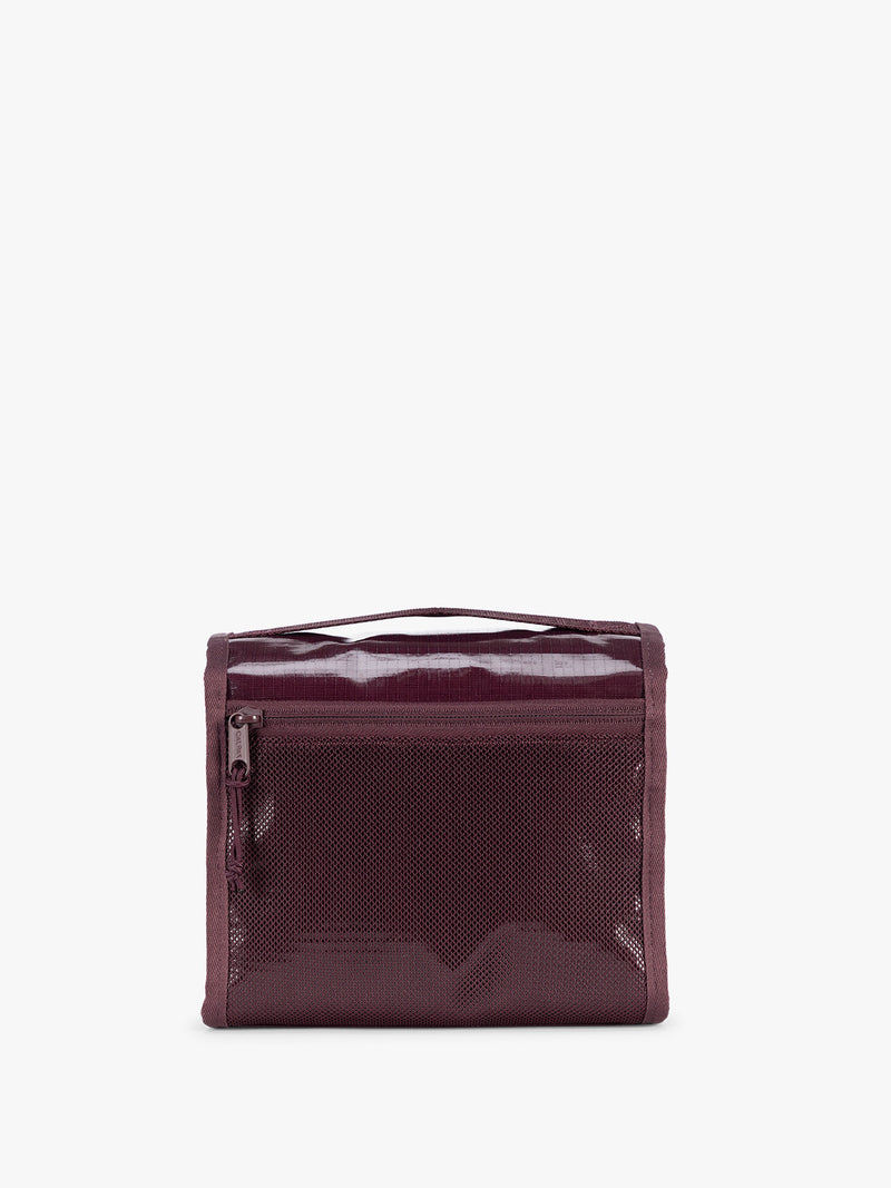 Back view showing zipper of CALPAK Terra Hanging Toiletry Bag to store makeup and toiletries in dark red  Dark Cherry on a white background