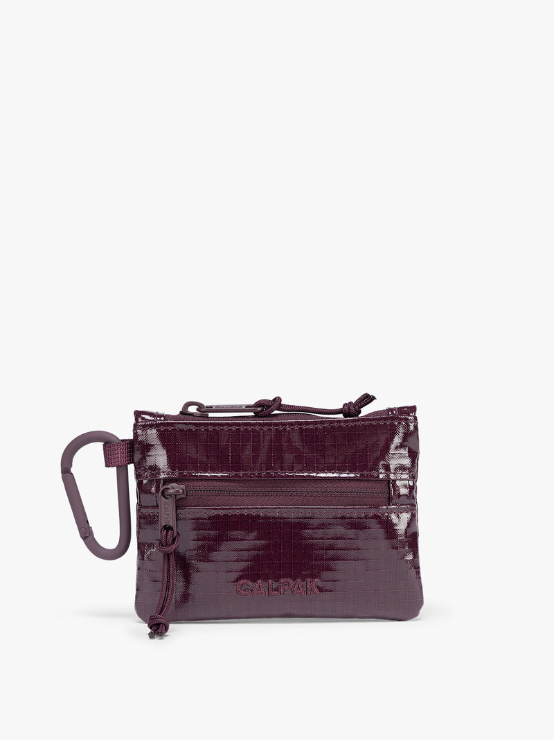 Dark red Dark Cherry CALPAK Terra Clippable Card Pouch with carabiner clip and zipper on a white background