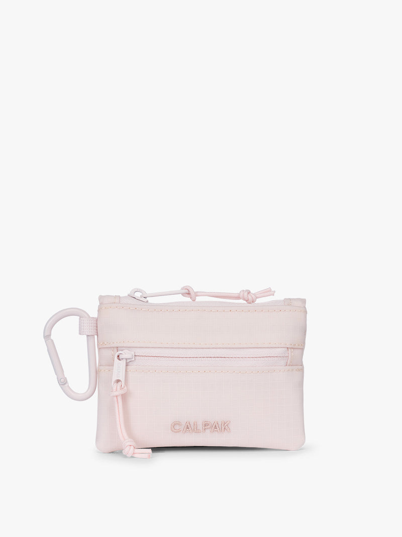 CALPAK Terra Clippable Card Pouch in shiny pink Shell Pink on a white background with a carabiner