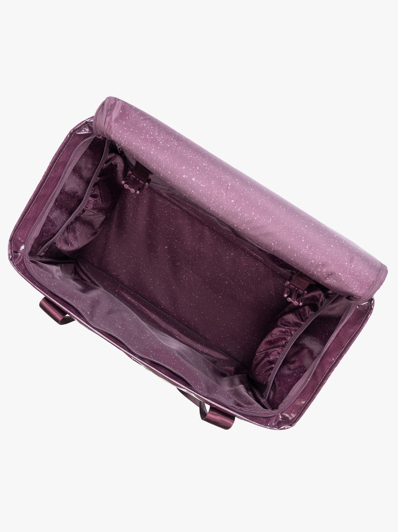 Opened CALPAK Terra 35L Tote Bag with zippers in dark red Dark Cherry on a white background