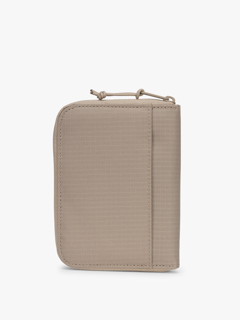 CALPAK Terra Zippered Passport Wallet in beige Stone Back view
