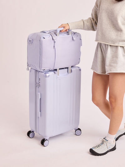 CALPAK Ambeur Medium Luggage in light lavender purple in Sea Glass with handles and spinner wheels on a white background; LAM1024-SEA-GLASS view 2