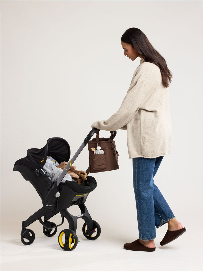 CALPAK Insulated Baby Bottle Bag in brown Hazelnut on stroller