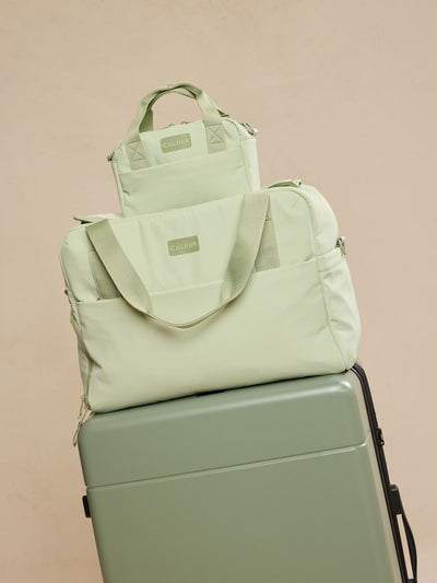 CALPAK Connect Crossbody Bag in light green Meadow with a visible brand logo on a white background; CCN2501-MEADOW view 2