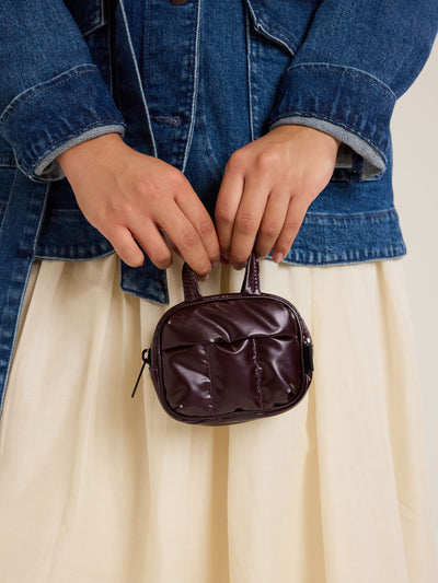CALPAK Luka Duffel Key Pouch in maroon Glazed Dark Cherry on a white background; ALK2501-GLAZED-DARK-CHERRY view 2