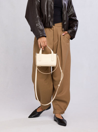 CALPAK Haven Mini Crossbody Bag in beige Buttercream; AMC2501-BUTTERCREAM view 2