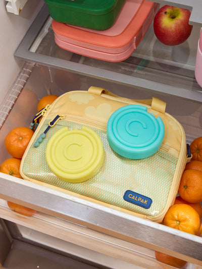 CALPAK circular Ice Packs that comes in a set of 2 in blue and yellow with letter C initial in the middle; AIP2501-AQUA-YELLOW view 2