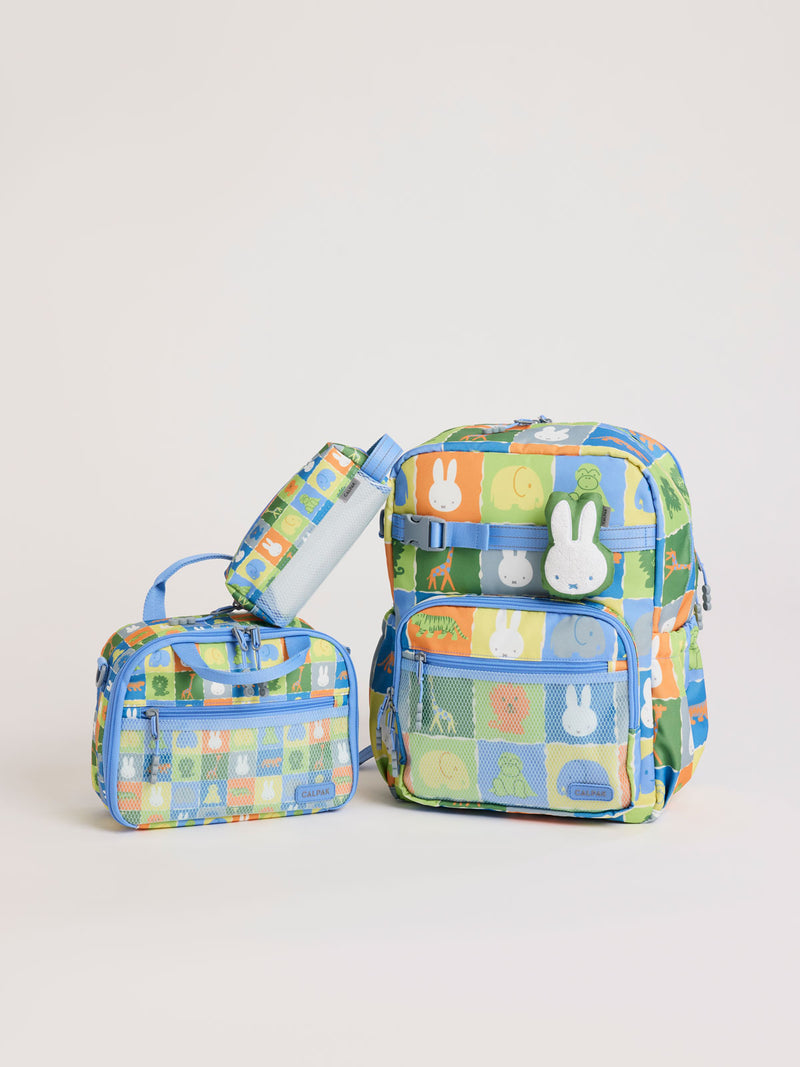 Colorful CALPAK + Miffy Kids Essentials Set with children's Large backpack, lunch bag , pencil case set on a white background with blue accents and Miffy with other animals