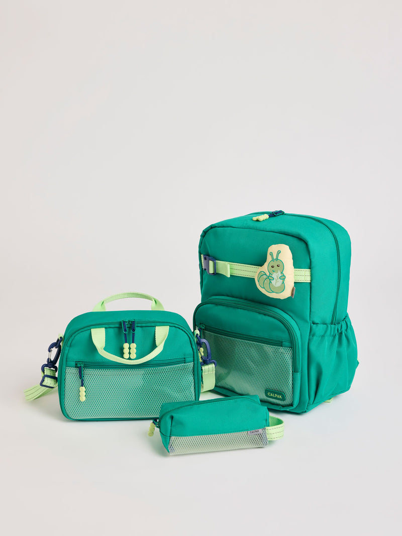 Green CALPAK Kids Small Essentials Bundle that includes backpack and lunch bag, and pencil case light gray background