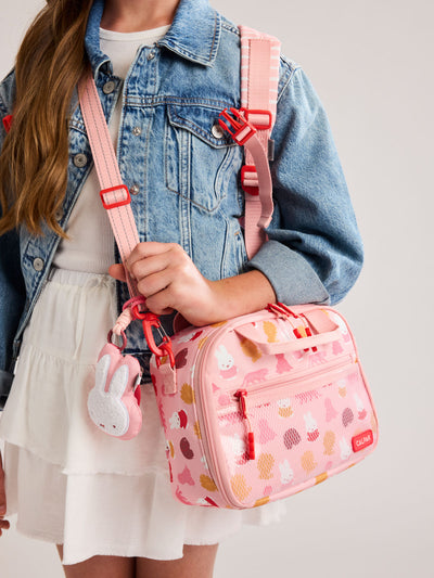 Pink CALPAK Kids Lunch Bag with Miffy and animal pattern with mesh front pocket and top handles on a white background; CKLB2501-MIFFY-PINK-ZOO-TRIP view 2