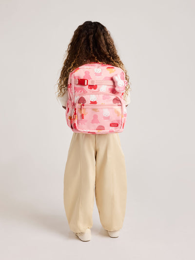 Front view of CALPAK Kids Medium Backpack with Miffy and pink colorful animal pattern on a white background; CKBM2501-MIFFY-PINK-ZOO-TRIP view 2