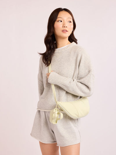 CALPAK Luka Crescent Tote bag in light green Celadon with shoulder strap and bag is expandable up to 2 on a white background; CBL2601-CELADON view 2
