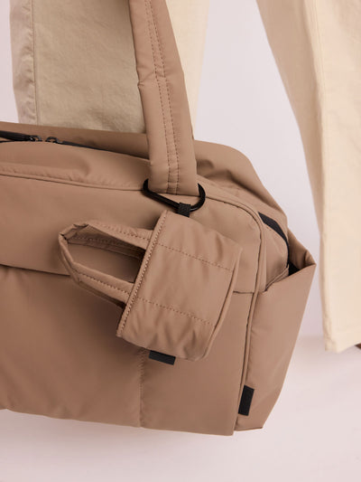 CALPAK Luka Tote Zip Bag Charm in light brown Chocolate with carabiner on a white background; AMT2601-CHOCOLATE view 2