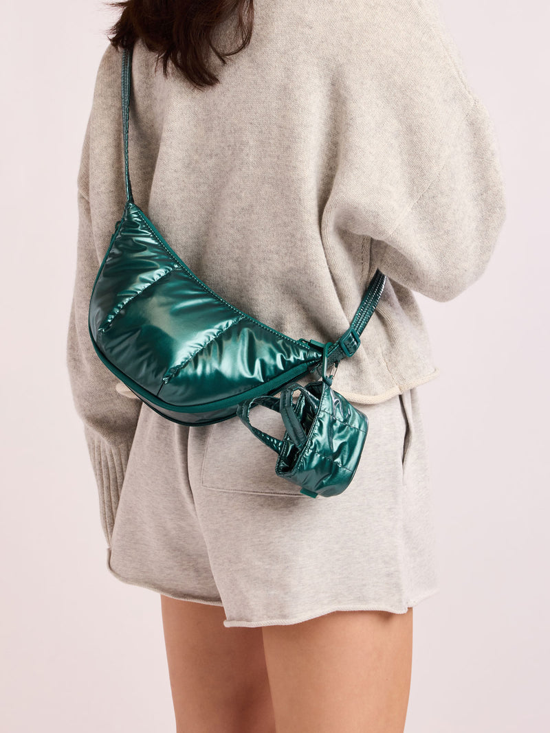 Model with bag with CALPAK Luka Tote Zip Bag Charm in dark green shiny Glazed Kale clipped on bag
