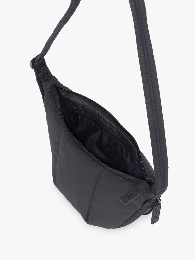 Opened CALPAK Luka Crescent Bag in Black