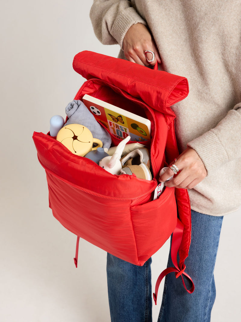 Baby items in CALPAK Mini Diaper Backpack in red Tomato